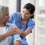 Image of a nurse discussing Medicare Part C benefits with a senior patient in a hospital, illustrating healthcare coverage and support.
